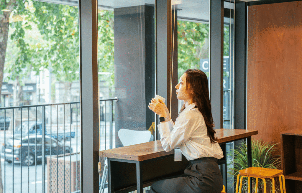 Image of woman at work taking a rest break.