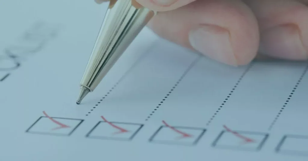 A red pen is checking off a list that qualifies sexual harassment by a boss in Oregon.