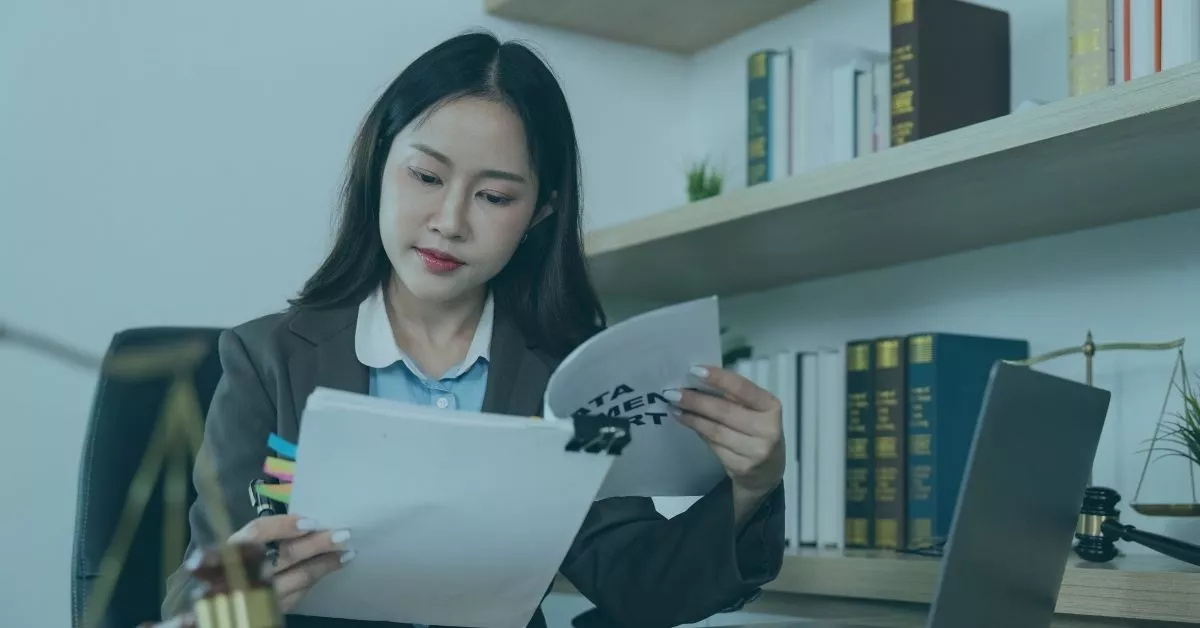 Lawyer overviewing a harassment claim, giving her best effort for her client.