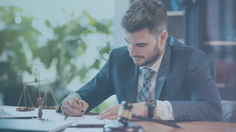 Lawyer writing a harassment claim, showing his best, undivided loyalty to this case.