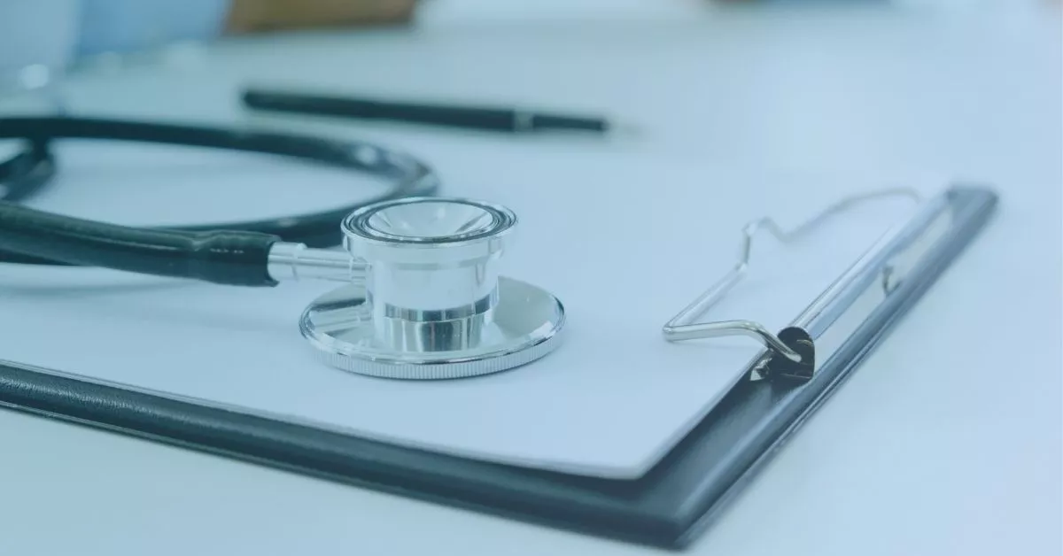 Stethoscope and clipboard representing administrative rules that clarify unfair dismissal after injury at work.