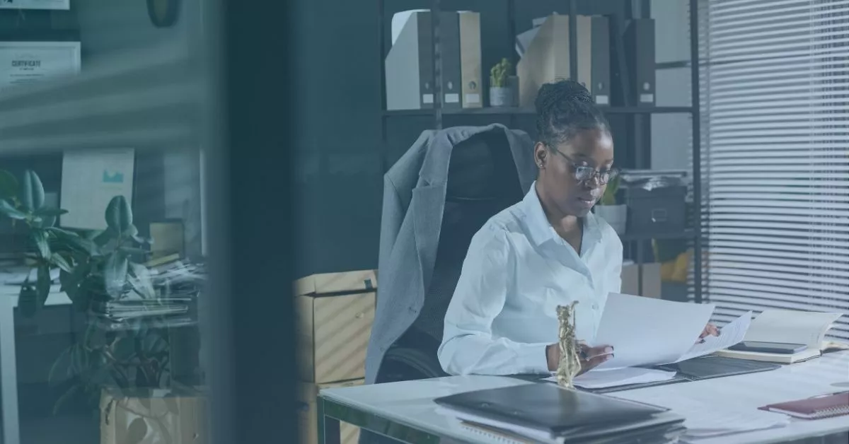 An Oregon worker researching her misclassification status after being wrongfully terminated.