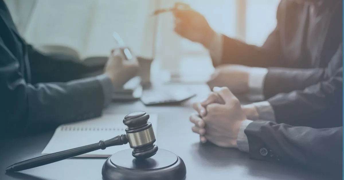 Legal consultation scene with gavel, representing what happens after filing a workplace sexual harassment complaint.